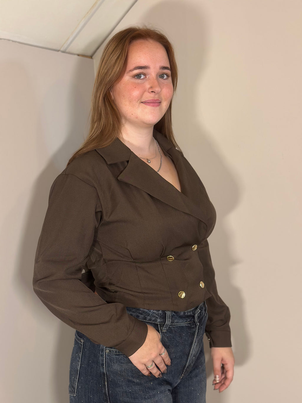 Bruine blouse met strik op de rug