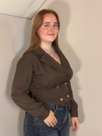 Bruine blouse met strik op de rug