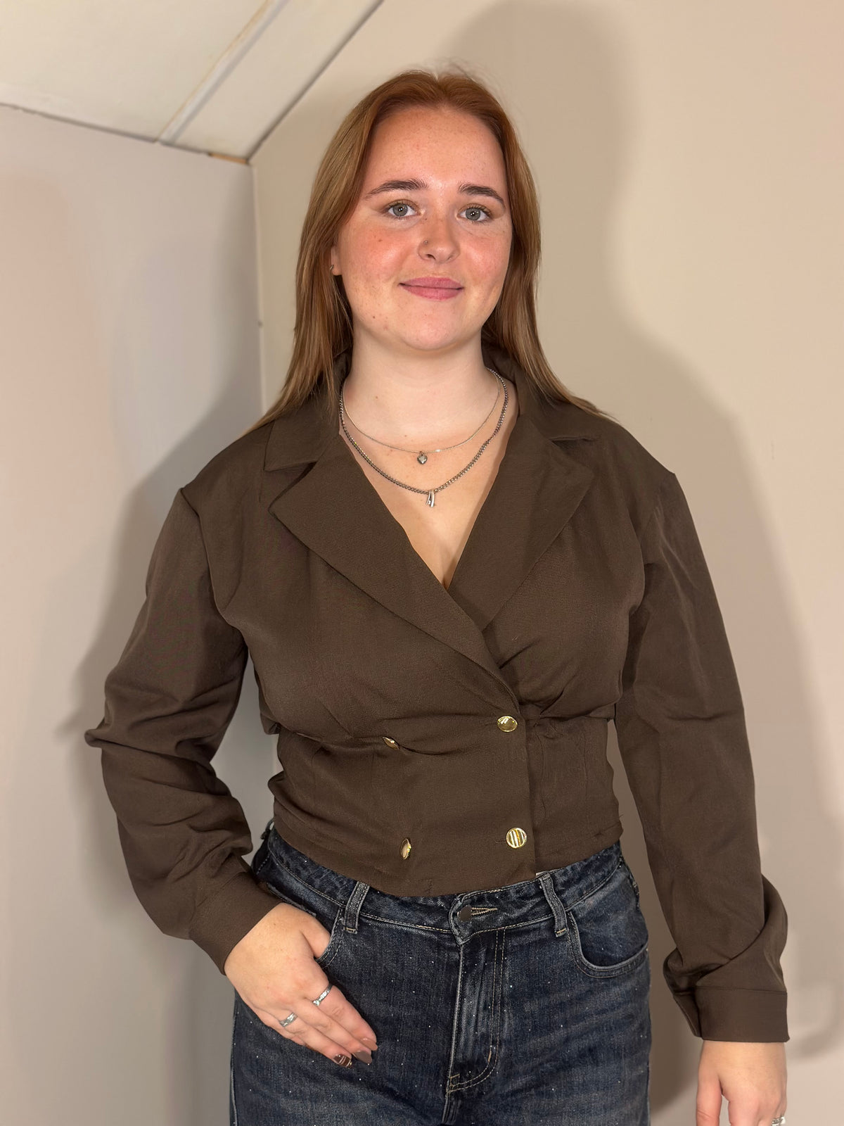 Bruine blouse met strik op de rug